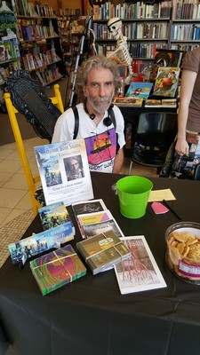 Chrome Oxide sitting with merchandise